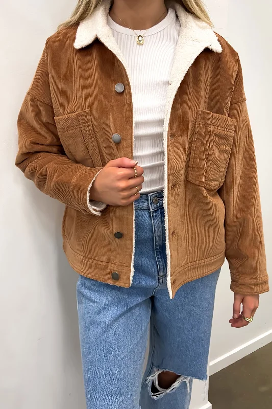 Women's quilted puffer jackets in a cropped silhouette for a modern twistHuntley Cord Jacket Tan Women's quilted puffer jackets in a cropped silhouette for a modern twistHuntley Cord Jacket Tan
