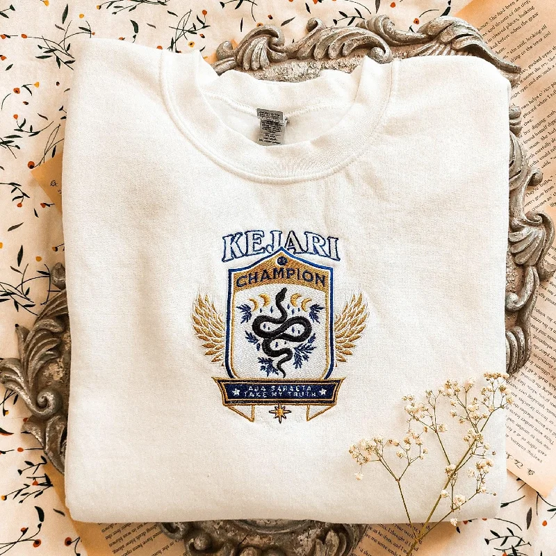Women's cropped sweatshirt with a slogan graphic for a fun and expressive lookKejari Embroidered Sweatshirt Women's cropped sweatshirt with a slogan graphic for a fun and expressive lookKejari Embroidered Sweatshirt