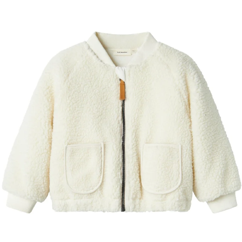 Women's quilted puffer jackets in a cropped silhouette for a modern twistLil'Atelier Coconut Milk Dino Lajo Bomber Jacket Women's quilted puffer jackets in a cropped silhouette for a modern twistLil'Atelier Coconut Milk Dino Lajo Bomber Jacket
