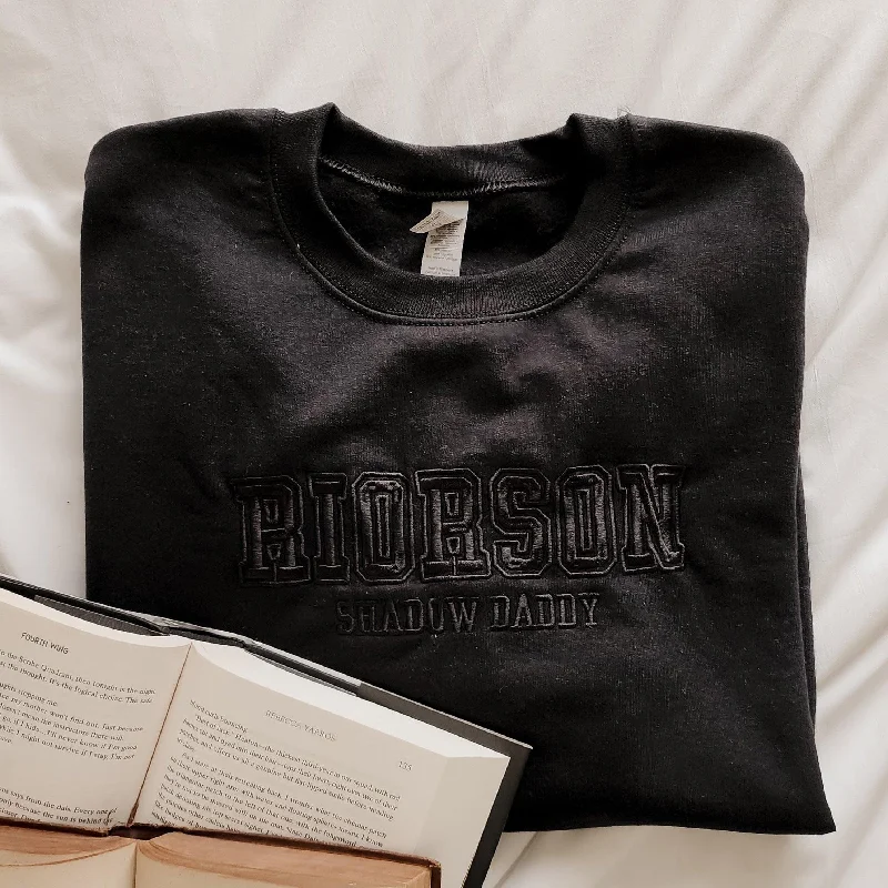 Women's hoodie with a glittery print for a glamorous and sparkly appearanceXaden Riorson Shadow Daddy Embroidered Sweatshirt Women's hoodie with a glittery print for a glamorous and sparkly appearanceXaden Riorson Shadow Daddy Embroidered Sweatshirt