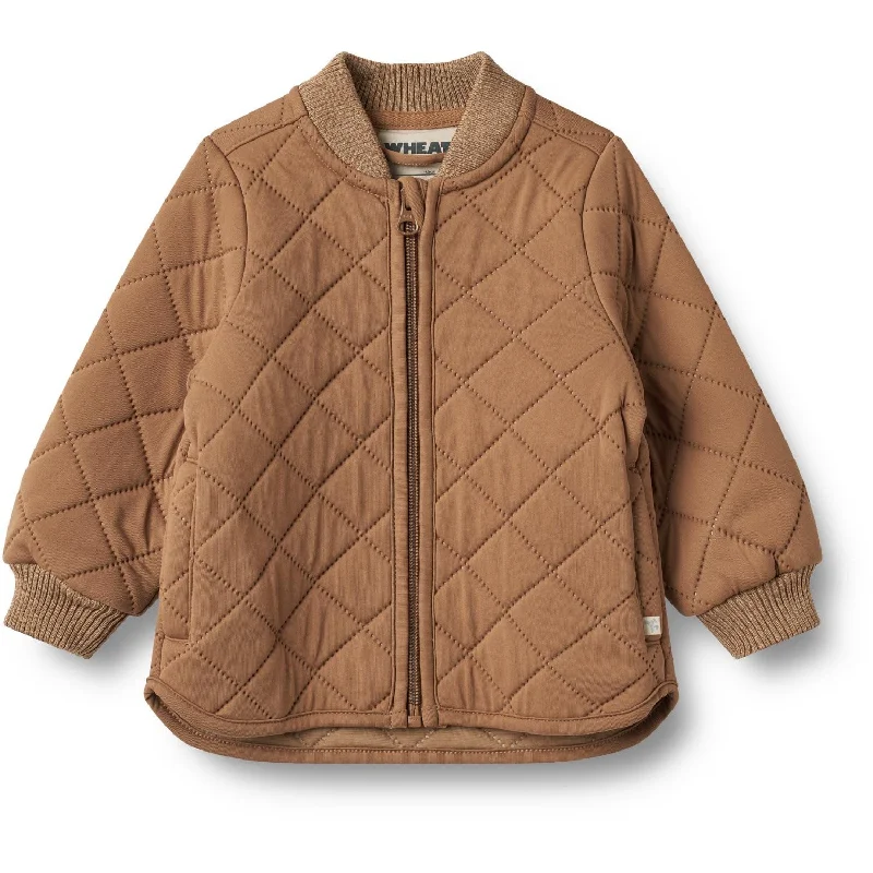 Women's cropped leather jackets with silver zippers for a punk - inspired outfitWheat Caramel Thermo Jacket Loui Women's cropped leather jackets with silver zippers for a punk - inspired outfitWheat Caramel Thermo Jacket Loui