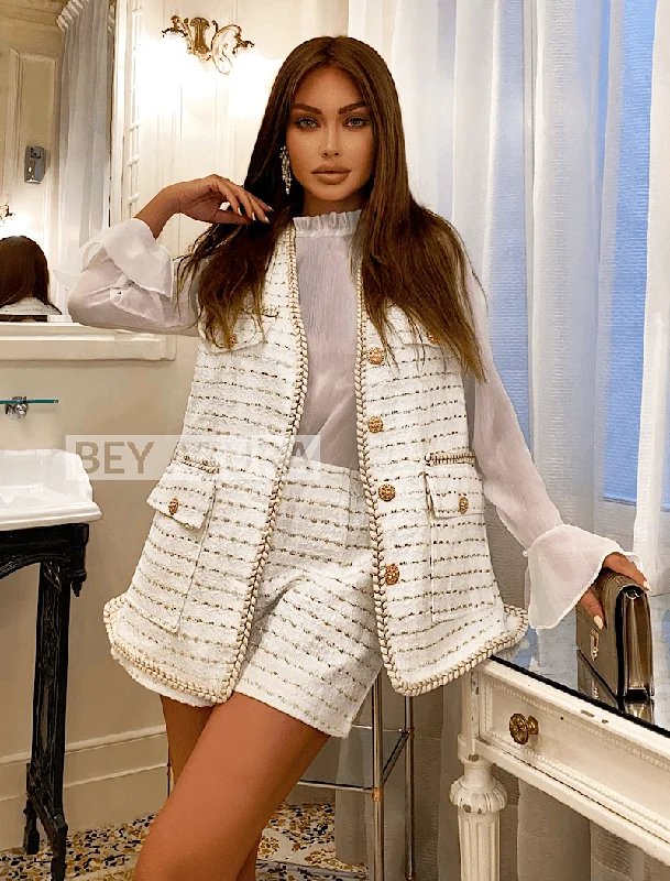 Women's cropped down jackets in bold colors for a sporty and fashionable winter outfitWhite and Gold Tweed Vest Shorts and Sheer Blouse Three Piece Set Women's cropped down jackets in bold colors for a sporty and fashionable winter outfitWhite and Gold Tweed Vest Shorts and Sheer Blouse Three Piece Set