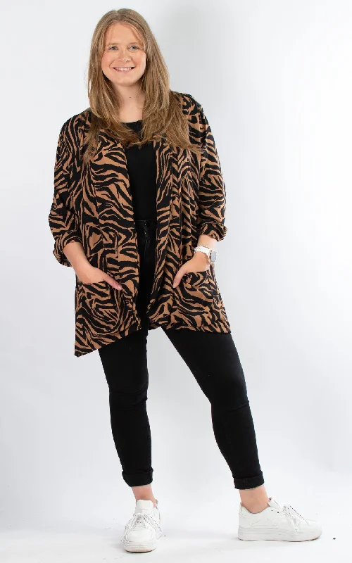 Women's waterproof rain jackets in bright yellow for high - visibility outdoor activitiesWhoopi Jacket | Animal Print | Zebra | Tan Women's waterproof rain jackets in bright yellow for high - visibility outdoor activitiesWhoopi Jacket | Animal Print | Zebra | Tan