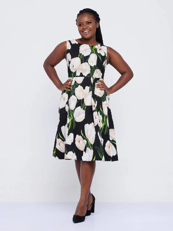 Midi dresses with sheer panels for a touch of allureThe Fashion Frenzy Tulip Skater - Black Midi dresses with sheer panels for a touch of allureThe Fashion Frenzy Tulip Skater - Black