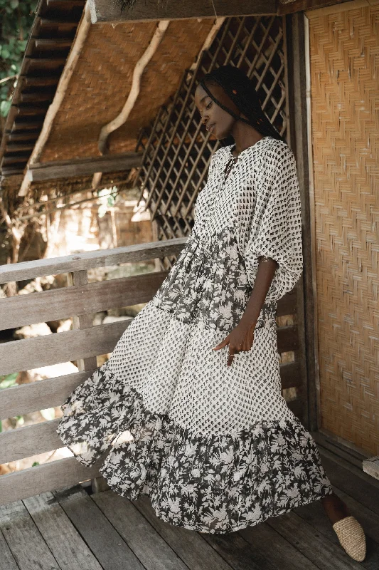 Maxi dresses with cut - out details on the sides for a modern edgeNora Maxi Dress ~ Noir Maxi dresses with cut - out details on the sides for a modern edgeNora Maxi Dress ~ Noir